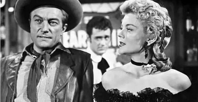 Richard Denning as Steve Ward and Peggie Castle as Maria 'Oklahoma' Saunders, former lovers reunited in The Oklahoma Woman (1956)