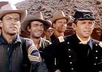 Richard Egan as Sgt. Bernard, Jack Elam as Mescal Jack and John Hudson as Lt. Bascom watch the Apache approach in The Battle at Apache Pass (1952)