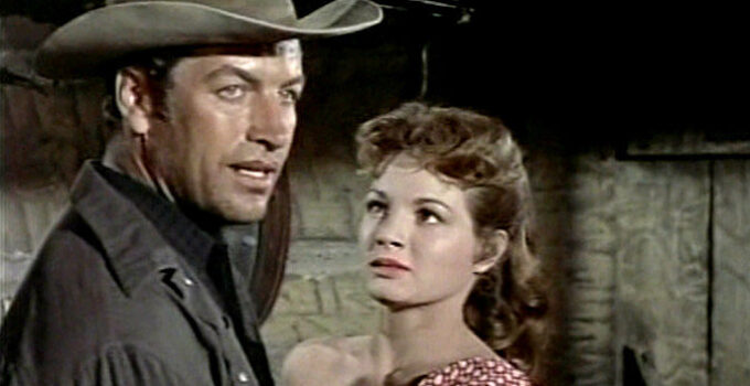 Richard Egan as Wes Tancred, fending off the advances of Cathy Older (Angie Dickinson) in Tension at Table Rock (1956)