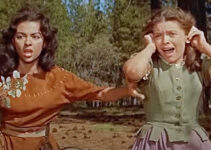 Rita Moreno as Hetty and Cathy O'Donnell as Judith, spotting their father on a stake surrounded by fire in The Deerslayer (1957)