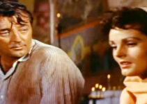 Robert Mitchum as Wilson and Ursula Thiess as Lisa Kennedy, finding time for romance in Bandido! (1956)