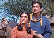 Jana Davi as Rosita and Robert Knapp as Gil Reardon, spotting Indian trouble on the horizon in Gunmen from Laredo (1959)