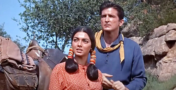 Jana Davi as Rosita and Robert Knapp as Gil Reardon, spotting Indian trouble on the horizon in Gunmen from Laredo (1959)