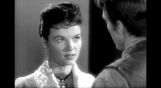 Patricia Tiernan as Lorraine Sayburn, trying to rekindle a romance with Tom Herrera in Apache War Smoke (1952)
