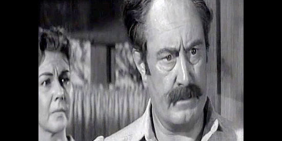 Patrick O'Moore as McKenzie, the trading post owner who doesn't want to turn over the medical supplies for fear of raising Little Otter's ire in Blood Arrow (1958)