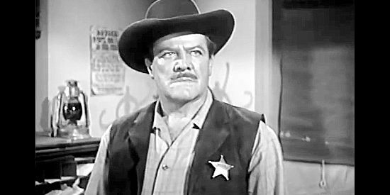 Paul Birch as the sheriff, unsure whether to align himself with a government agent or the Indian-hating residents of his town in Apache Woman (1955)