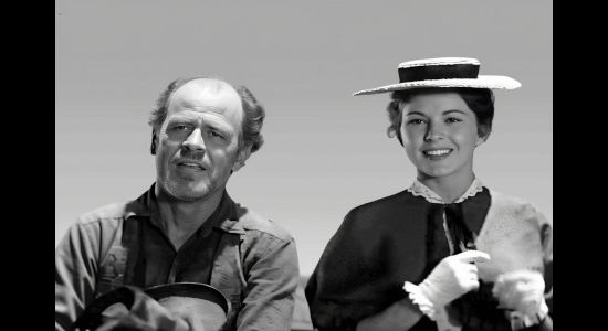 Paul Brinegar as Charlie Martin, wondering what brought school techer Nora Haynes (Coleen Gray) West in Copper Sky (1957)