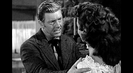 Paul Langton as Dan Traver, the man who hires Jack Slade, trying to talk sense into Virginia Maria Dale in Jack Slade (1953)