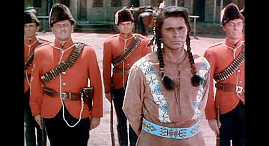 Paul Marion as Eagle Heart, accused of murder and awaiting his sentencing in Fort Vengeance (1953)