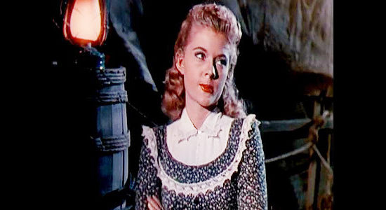 Peggie Castle as Ann Wilkins, a least momentarily unimpressed with Jeff Curtis in Wagons West (1952)