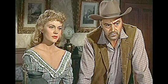 Peggie Castle as Reva and Mickey Simpson as Deputy Jeff Barclay, with a warning for Cibo Pearlo in Tall Man Riding (1955)