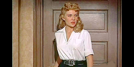 Peggie Castle as Reva, the saloon girl on Cibo Pearlo's arm and payroll in Tall Man Riding (1955)