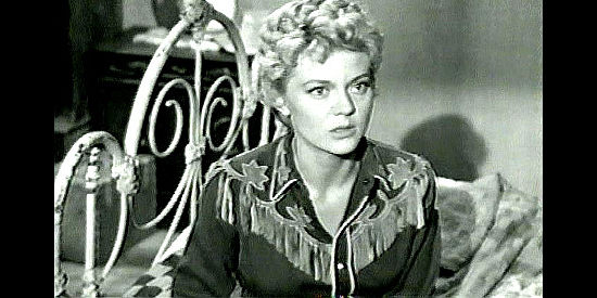 Peggy Castle as Kate Masters, remembering the long ago day her parents were killed in Two-Gun Lady (1955)