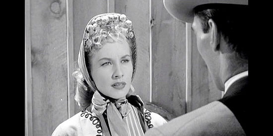 Penny Edwards as Columbine Dalton, meeting the man she's falling for in The Dalton Girls (1957)