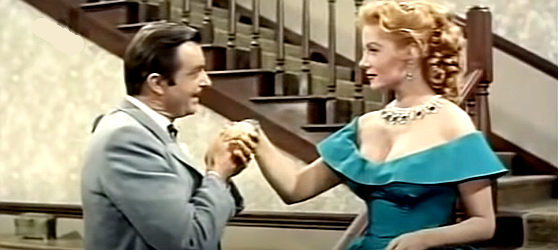 Peter Adams as John Parnell, trying to charm Cheyenne (Rhonda Fleming) in Bullwhip (1958)