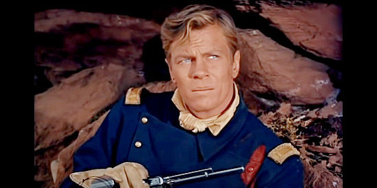 Peter Graves as Lt. Ben Keegan, wounded an awaiting the next attack in Fort Yuma (1955)