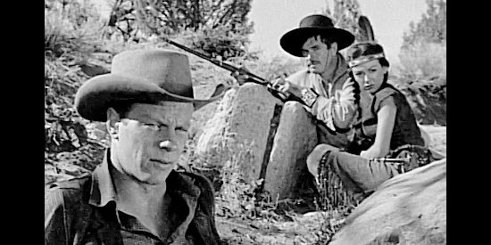 Peter Graves as Walt Sawyer with Tonio Perez (Noah Beery Jr.) and Honey Bear (Rita Moreno) looking on in The Yellow Tomahawk (1952)