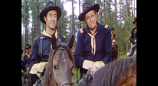 Peter Hansen as Lt. Weston Hathersall and Richard Rober as Capt. Arnold Vaughant, relying on Jim Aherne to lead an attack on an Indian camp in The Savage (1952)