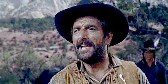 Peter Mamakos as Blackfoot Sam, the white man who trades whiskey to the Indians in Quincannon, Frontier Scout (1956)