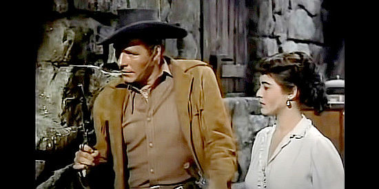 Phil Carey as Wayne Harper with Paris Elliott (Roberta Haynes), the woman he once loved in The Nebraskan (1953)