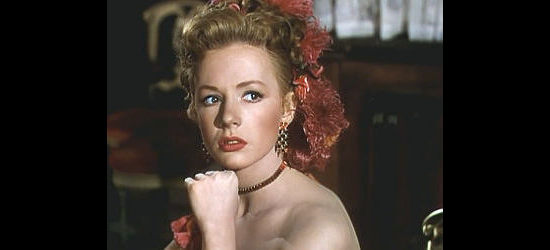 Piper Laurie as Rannah Hayes, realizing her fate will be determined by a hand of cards in Dawn at Socorro (1954)