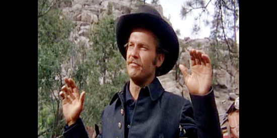 Ralph Meeker as Roy Anderson, dishonorably discharged from the cavalry and on the run from an angry Blackfoot chief in The Naked Spur (1953)