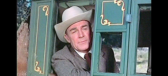 Randolph Scott as Capt. John Hayes, witnessing a Civil War homecoming in Westbound (1959)