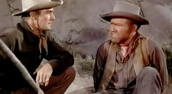 Randolph Scott as Jackson 'Sugarfoot' Redan, threatening Billings (Gene Evans) with a rattlesnake in Sugarfoot (1951)