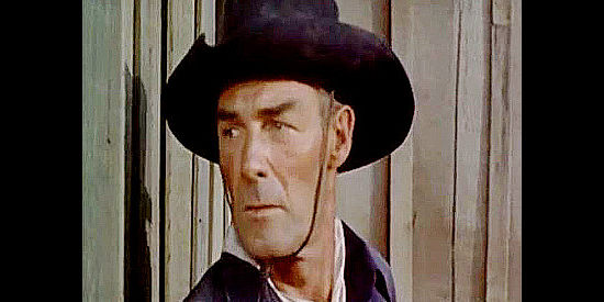 Randolph Scott as Jim Kipp, a bounty hunter closing in on thee three men he's seeking in The Bounty Hunter (1954)