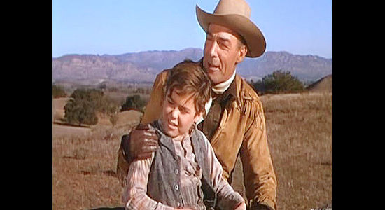 Randolph Scott as Ned Britt showing Toby Nickerson (Pat Mitchell) his first cattle drive in Fort Worth (1951)