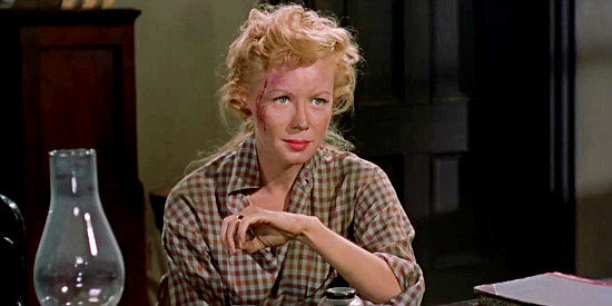 Randy Stuart as Nan Hogan, Lew's wife, bearing the marks from a catfight with Nellie Matson in Star in the Dust (1956)