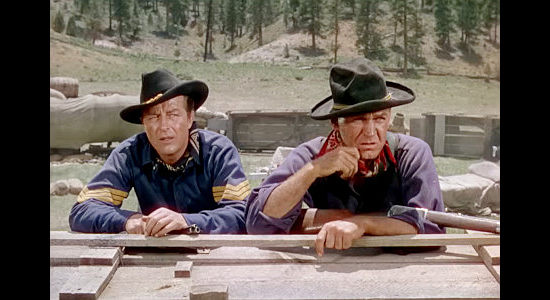 Ray Milland as Ken Shafter and Forrest Tucker as Donavan, awaiting another charge by the SIoux in Bugles in the Afternoon (1952)
