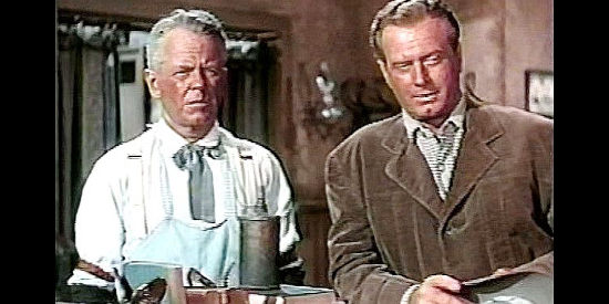 Regis Toomey as newspaper editor Tom Wren with George Clark (James Seay), the man his daughter plans to marry in Son of Belle Starr (1953)