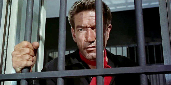 Richard Boone as Sam Hall, reacting to the sound of the gallows being tested in Star in the Dust (1956)