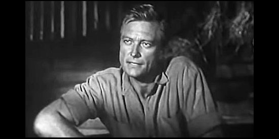 Richard Denning as Bruce Merritt, the man who arrives in Bitter Water to buy a doctor's practice in The Buckskin Lady (1957)