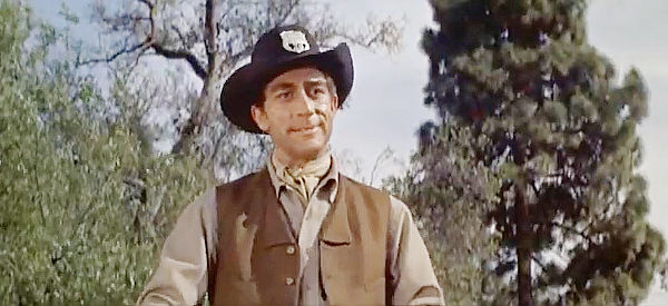 Richard Devon as the wise-cracking prison guard whose life The Dutchman saves in The Badlanders (1958)