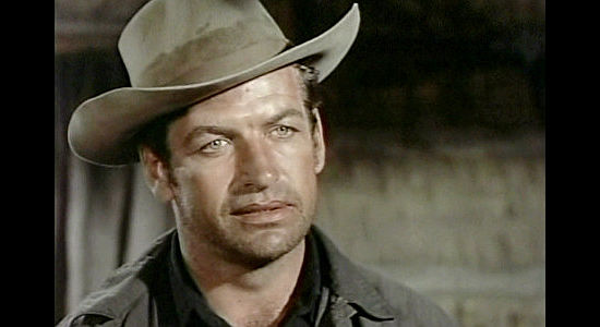 Richard Egan as Wes Tancred, a man unjustly branded a double-crossing coward in Tension at Table Rock (1956)