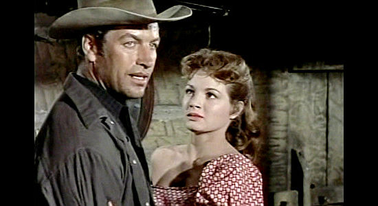 Richard Egan as Wes Tancred, fending off the advances of Cathy Older (Angie Dickinson) in Tension at Table Rock (1956)