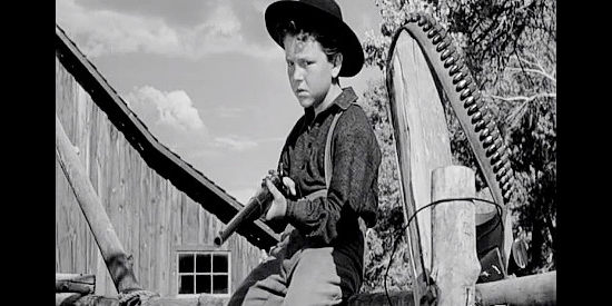 Richard Eyler as Chad Gray, keeping watch on a suspected horse thief in Fort Dobbs (1958)