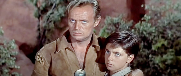 Richard Widmark as Comanche Todd with Billy (Tommy Rettig), the young boy he befriends in The Last Wagon (1956)