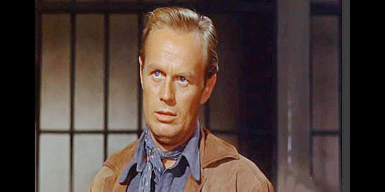 Richard Widmark as Jim Slater, the man determined to solve the mystery of Gila Valley in Backlash (1956)