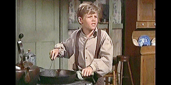 Rickie Sorenson as Larry Thompson, the boy whose father was killed by Rice Martin's henchmen in The Hard Man (1957)