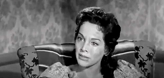 Rita Baron as Conchita, after being beaten by men in search of information in The Broken Star (1956)