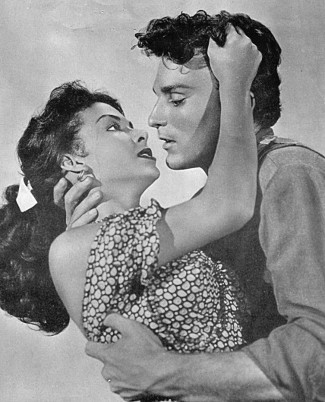 Rita Moreno as Bridget Fitzgibbon and Keith Larsen as Carey Ross in Fort Vengeance (1953)