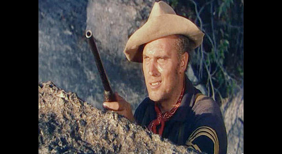 Robert J Wilke as Sgt. Stone, suspicious of Bannon and awaiting the next attack in Arrowhead (1953)