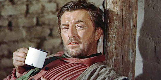 Robert Mitchum as Martin Brady, recovering from a broken leg north of the border in The Wonderful Country (1959)