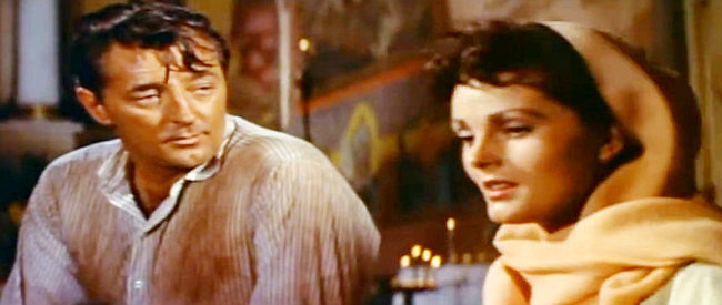 Robert Mitchum as Wilson and Ursula Thiess as Lisa Kennedy, finding time for romance in Bandido! (1956)