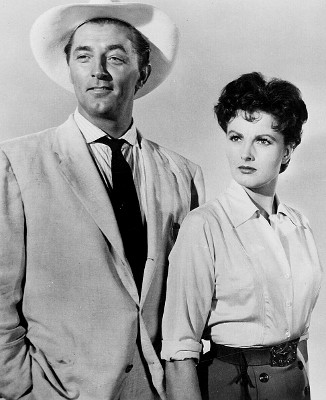 Robert Mitchum as Wilson and Ursula Thiess as Lisa Kennedy in Bandido (1956)