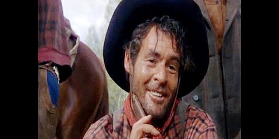 Robert Ryan as Ben Vandergoat, busy thinking up a way out of his predicament in The Naked Spur (1953)