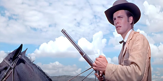 Robert Wagner as Josh Tanner, a surveyor sent to Laramie map out a town in White Feather (1955)